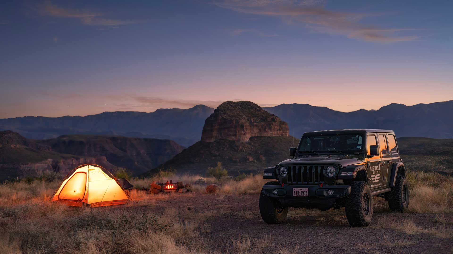 Big Bend Jeep rental beside a campsite in Far West Texas